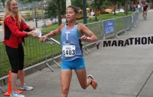 Kate Landau, shown at another race, kicked butt with the kiddies in the Portland 10K.
