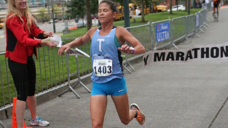 Kate Landau, shown at another race, kicked butt with the kiddies in the Portland 10K.