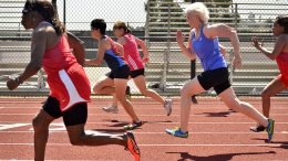 Brenda Matthews (red), Linda Cohn (middle) and Pat Kelly (blue) battle in a 50.