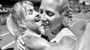 Lesley Hinz (left) hugs her friend Sue McDonald after Sue lowered her own W50 American record for the 800.