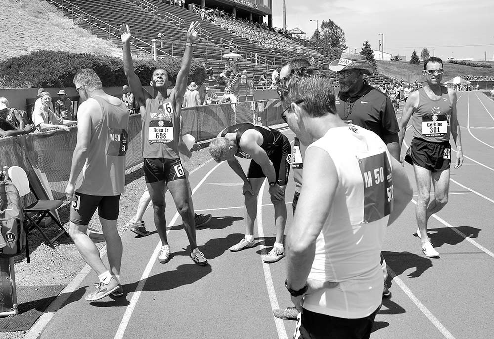 Almir Rosa Jr. of Pompano Beach, Florida, exults in his M50 800 victory.