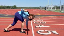 Diane plays with a cane at start of a workout as she makes comeback from knee surgery.
