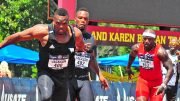M35 Patrick Jackson hands off to twin brother and former NFL player Fred Jackson in a 4x100 relay.