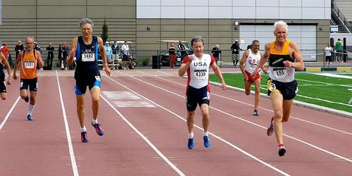 Peter Crombie (lane 3) outlegs Roger Pierce (4) and Larry Barnum (5) in the M65 final at 2011 Sacramento worlds.