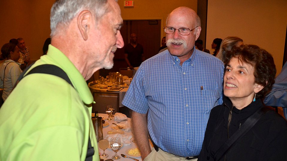 Jerry Bookin-Weiner and his wife, Hedy, chat with the late Rex Harvey at Michigan nationals banquet in 2018.