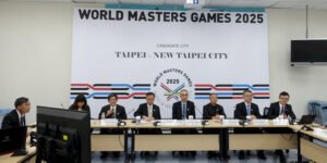 Rule No. 1 of World Masters Games publicity: Always feature your organizing team. Athletes? What athletes?