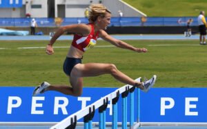 Rachel on way to 11.42 hurdles gold at 2016 Perth worlds.